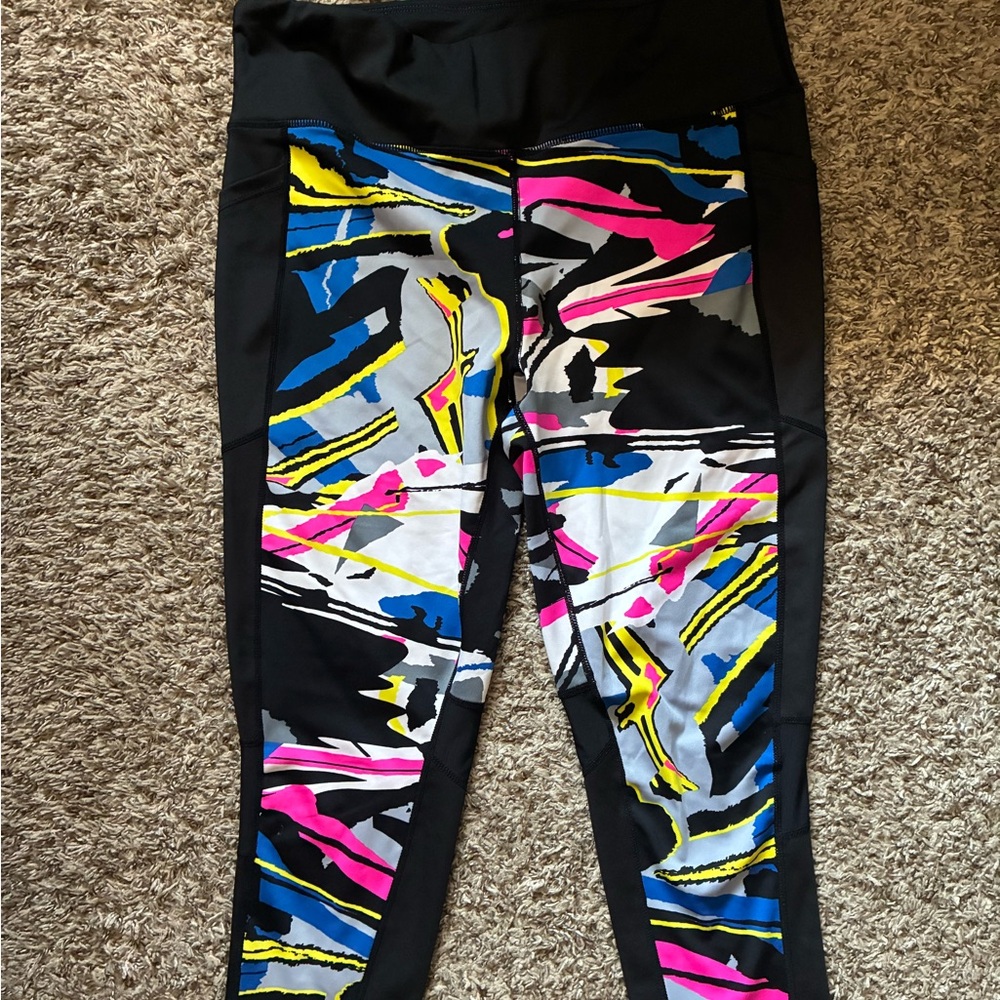 LuLaRoe exercise Leggings with Black, Pink, Blue, and Yellow Pattern
